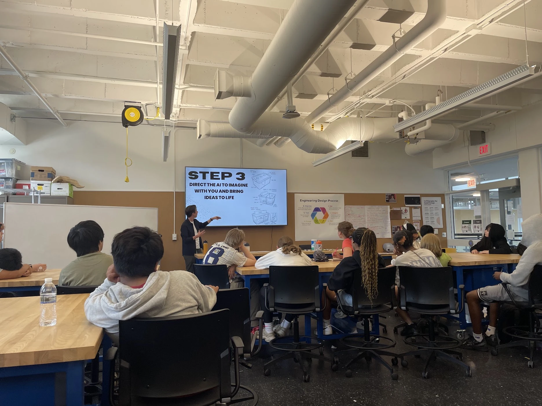 Milo presenting a slide titled Step 3: direct the AI to imagine with you, to a room of students
